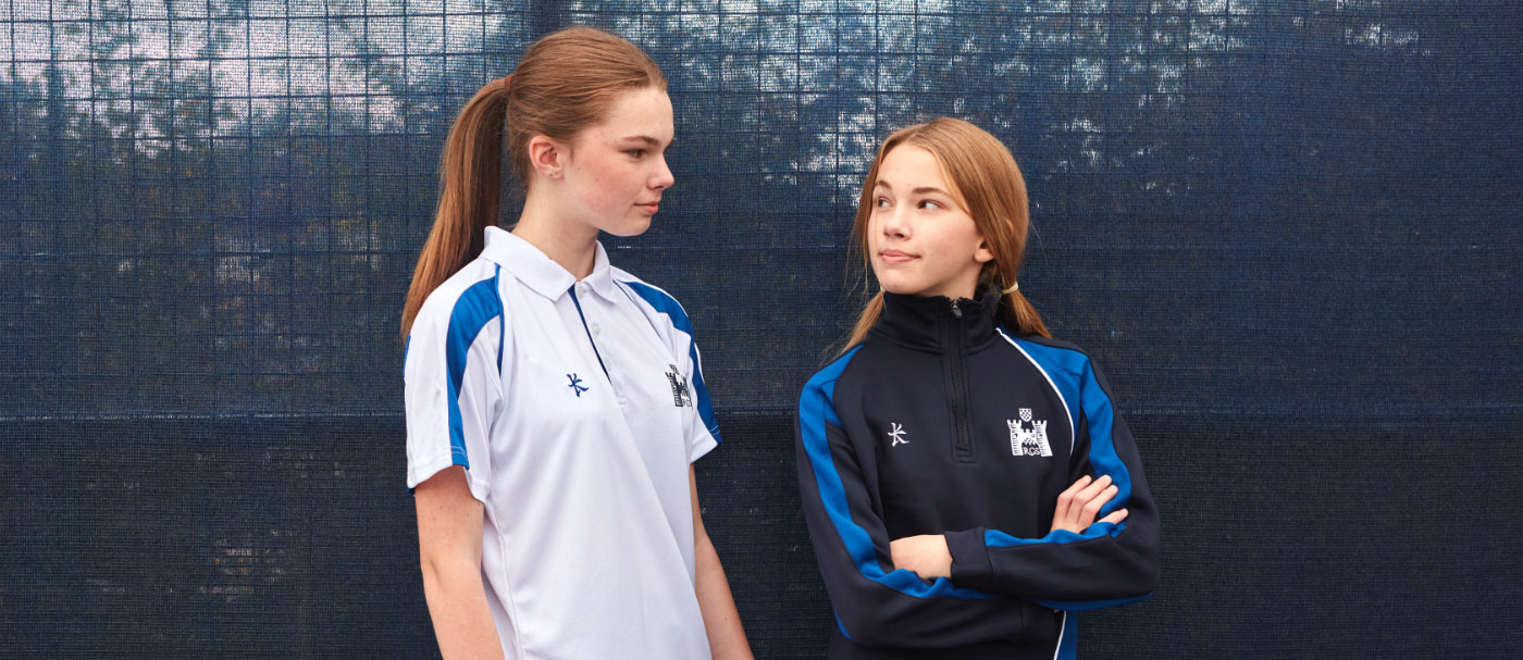 two girls in school sportswear